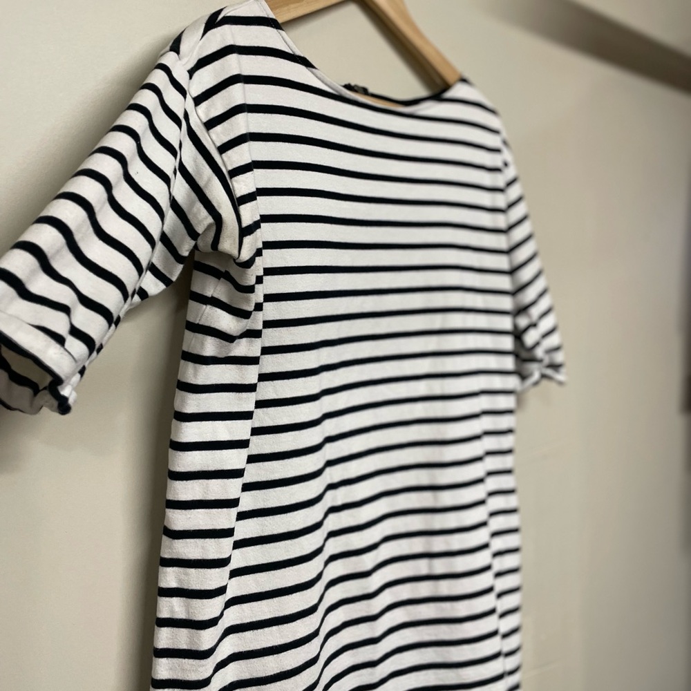 Black and white striped tunic.